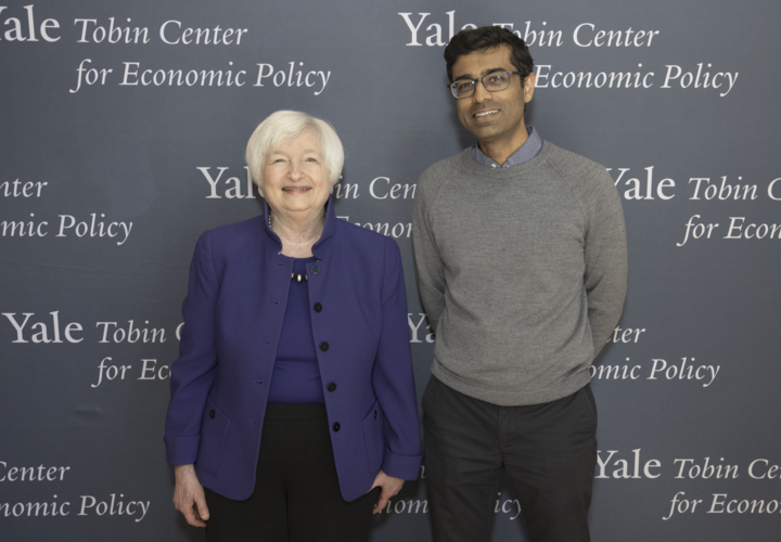 Janet Yellen and Amit Khandelwal posing in front of Tobin Center sign during Yellen's visit to Yale Tobin Center in April 2023.png