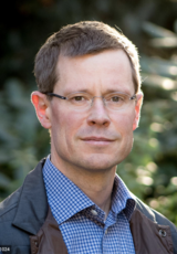 Headshot of Gregory Huber